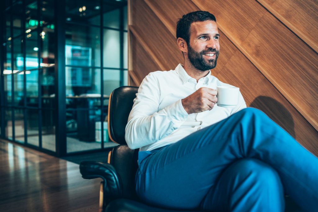 business professional seated in chair