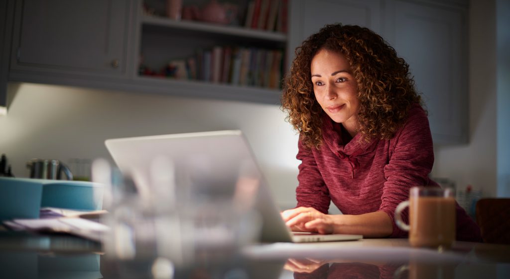 lady on laptop considering her finances